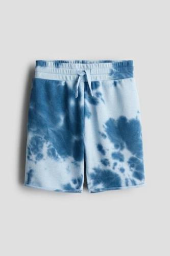 H&M Sweatshorts mit Print Hellblau/Batikmuster in Größe 170. Farbe: Li...