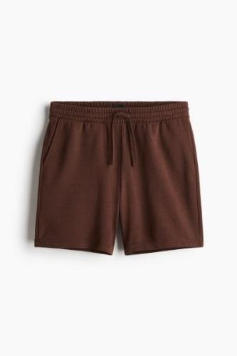 H&M Sweatshorts in Regular Fit Braun Größe XS. Farbe: Brown