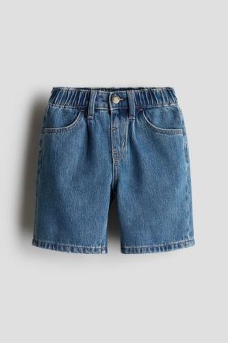 H&M Knielange Jeansshorts Denimblau in Größe 110. Farbe: Denim blue