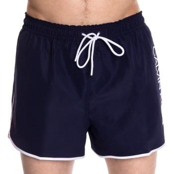 Calvin Klein Badehosen Core Solid Recycled Short Swim Shorts Marine Po...